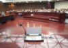 UFO Claims vs. Pentagon Findings Conference microphone on a podium in a courtroom