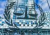 Hidden Camera Case Ends in 90-Year Prison Term Scales of justice emblem on glass facade of modern office building