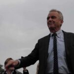 Robert F. Kennedy Jr. in a suit outdoors