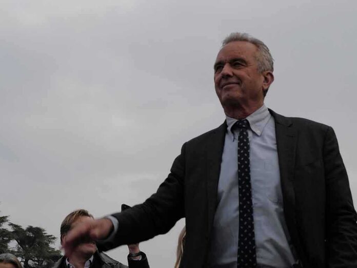 shutterstock_2075897200 Robert F. Kennedy Jr. in a suit outdoors