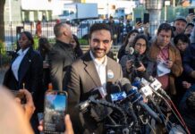 Unverified Claims Fuel Michigan Senate Fight Zohran Mamdani speaks at a press conference; Julia Bacha is visible among the crowd