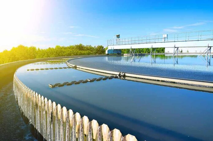 shutterstock_576627958 Circular wastewater treatment clarifier with overflow weirs