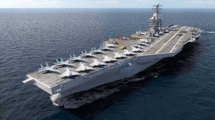 shutterstock_661498807-1 Aircraft carrier at sea with fighter jets on deck